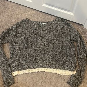 Black and white sweater size L.